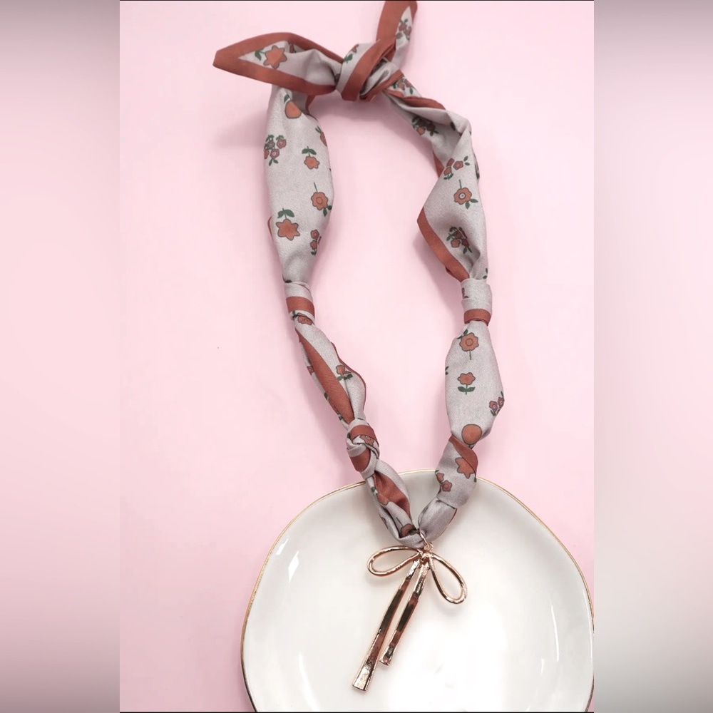 Floral Patterned Silk Necklace with Bow Accent